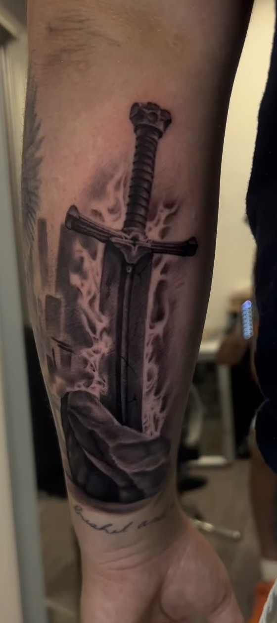 Black and grey realism tattoo by Masoo